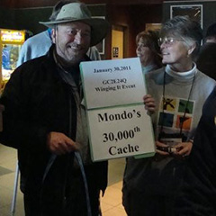 Mondo with a congratulatory 30K cache card